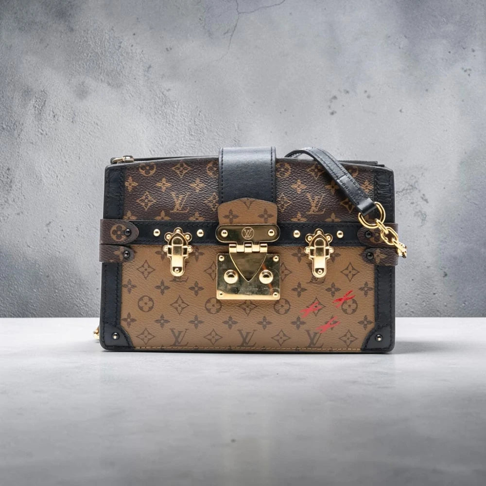 Louis Vuitton | Monogram Reverse Trunk Clutch crossbody bag