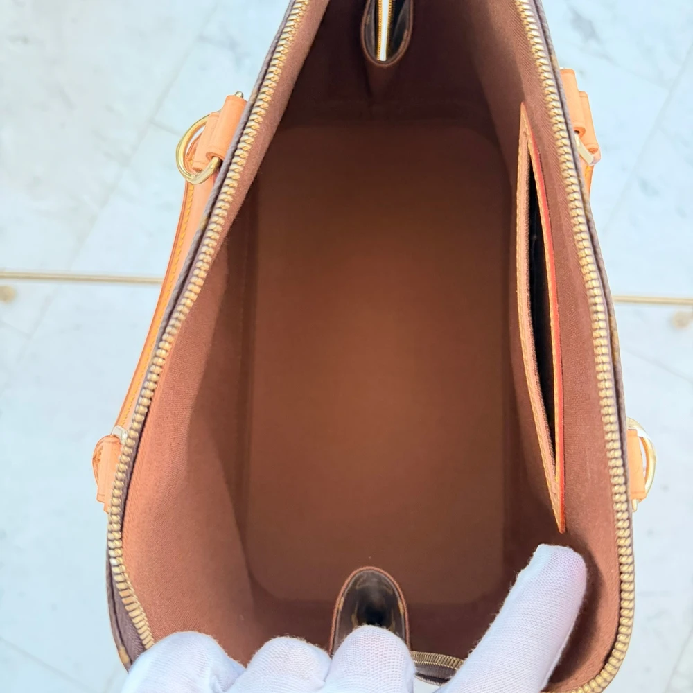 Louis Vuitton | Alma PM monogram handbag