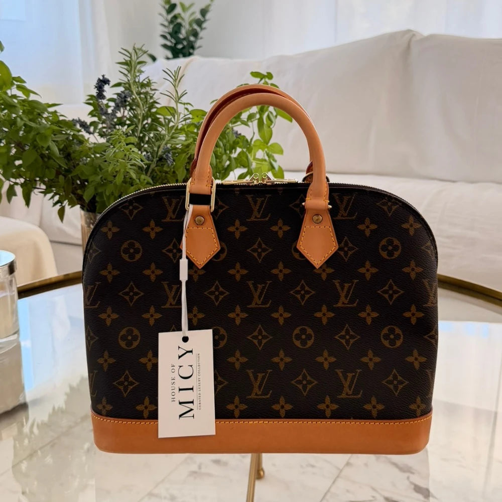 Louis Vuitton | Alma PM monogram handbag