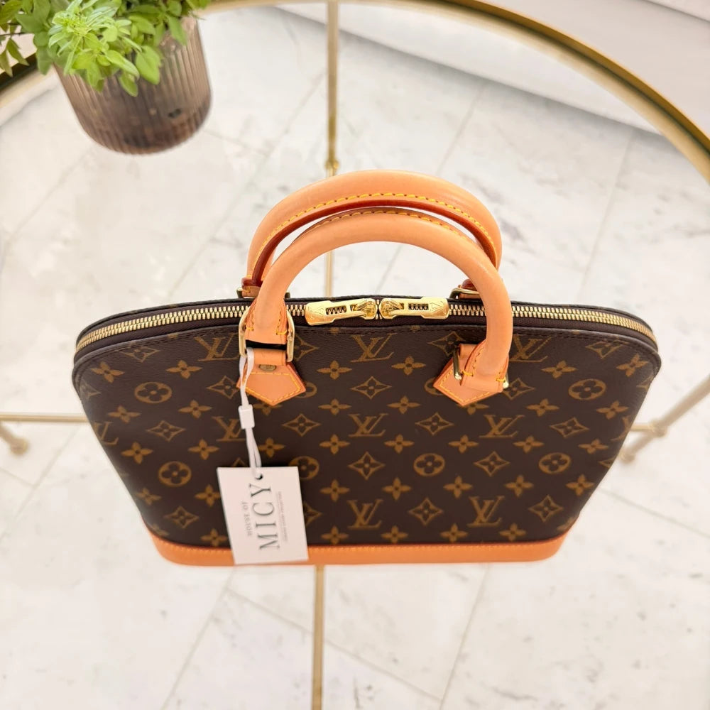 Louis Vuitton | Alma PM monogram handbag