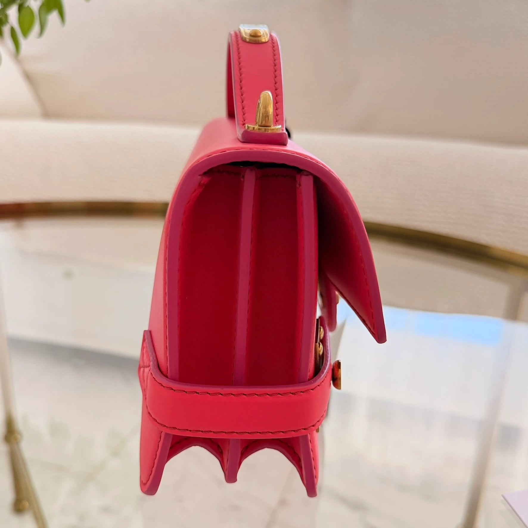 Balmain | 24 B-Buzz leather crossbody bag in Pink