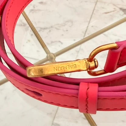 Balmain | 24 B-Buzz leather crossbody bag in Pink