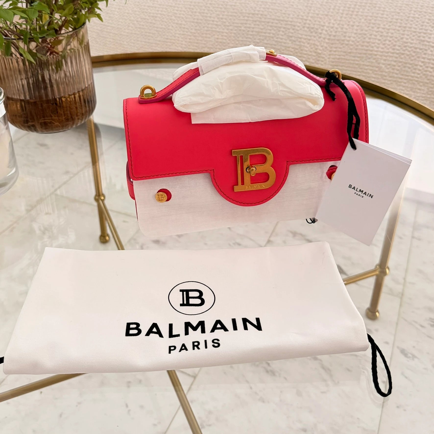 Balmain | 24 B-Buzz leather crossbody bag in Pink