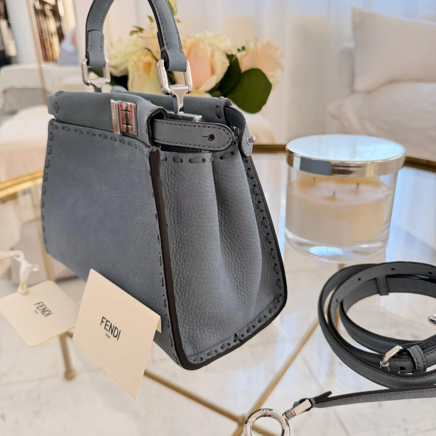 Side shoot of Fendi Mini Peekaboo tote bag, with strap, structured leather with double clasp available in Cyprus at HOUSE of MICY