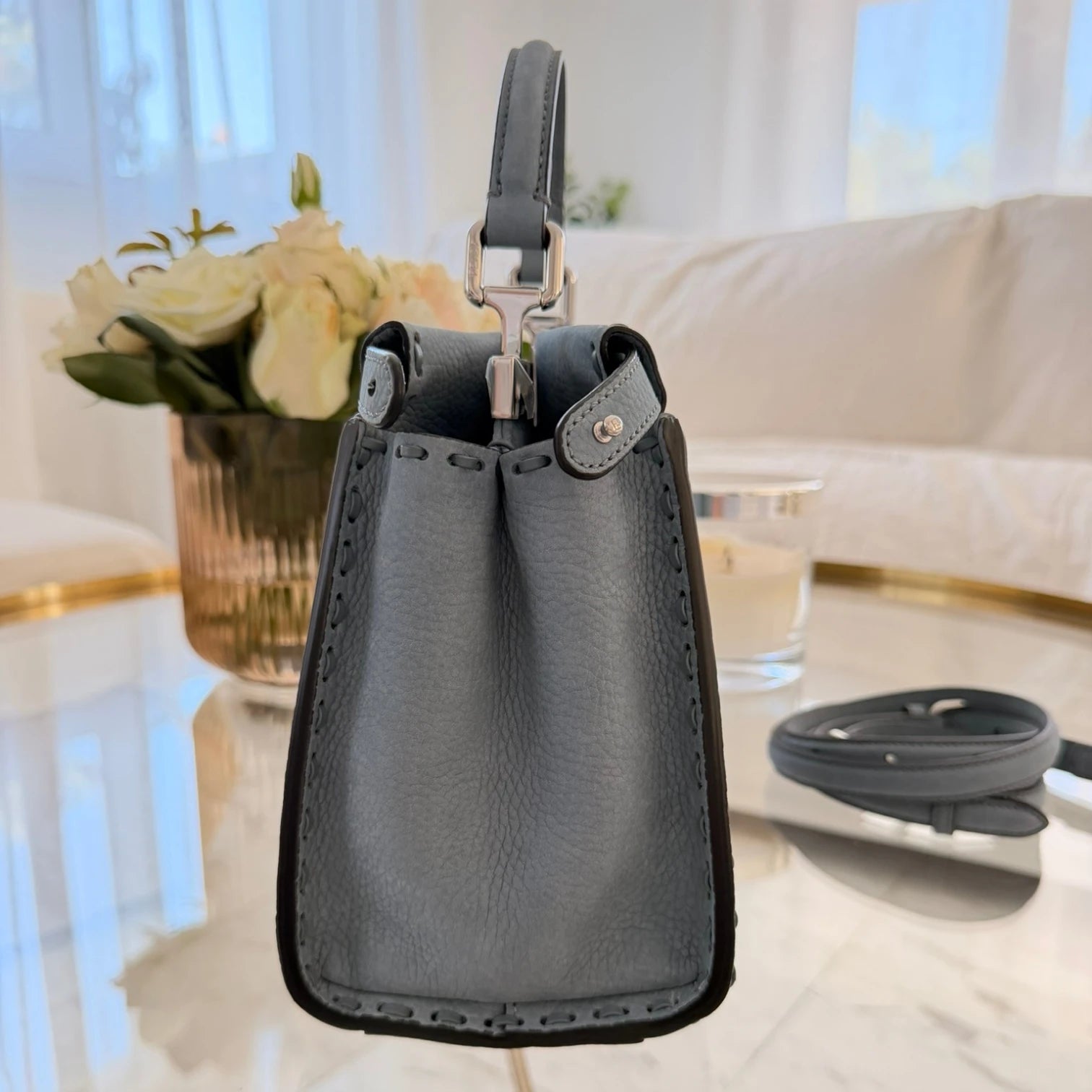 Detailed stiches pf Fendi Mini Peekaboo tote bag, structured leather with double clasp available in Cyprus at HOUSE of MICY